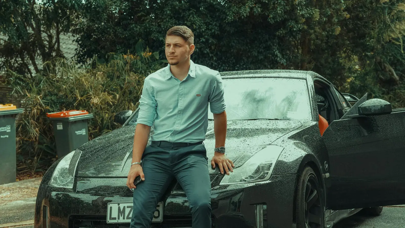 Professional next to car